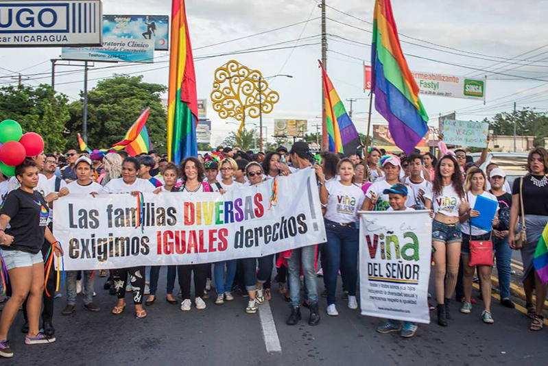 NDI Photo Citizens marching in a parade.